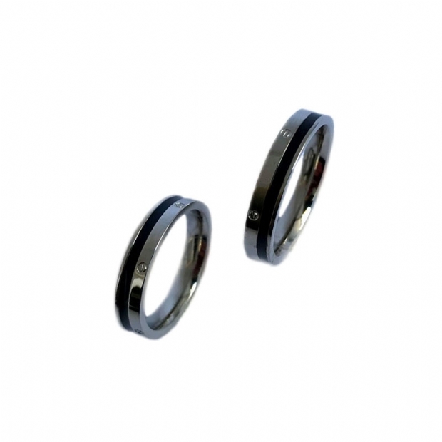 Bicolour steel wedding rings with nail head decoration