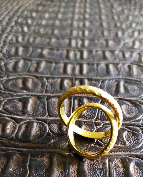 Handmade, hammered 22K gold wedding rings